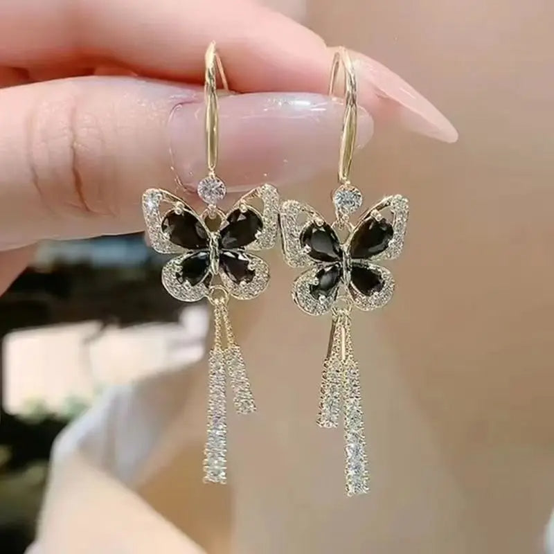 Pendientes de borla de mariposa de cristal